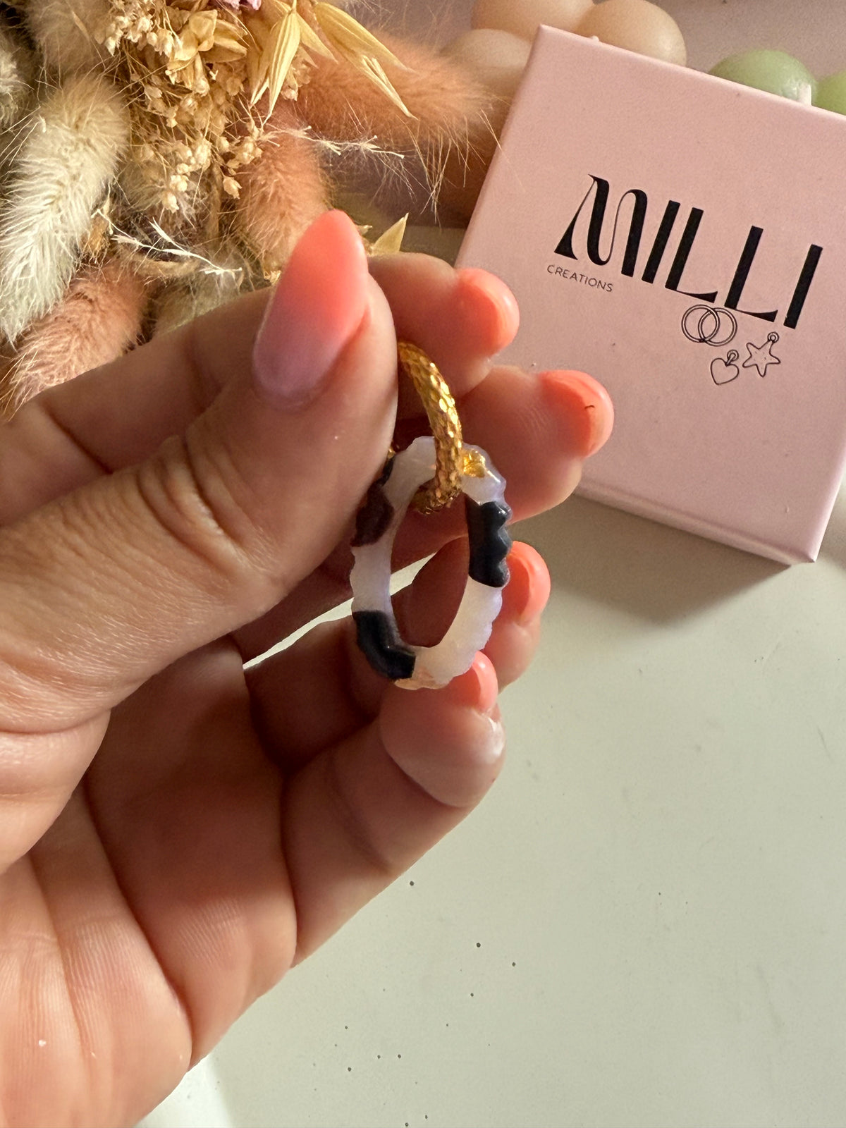 Charms Tif translucide noir et brun