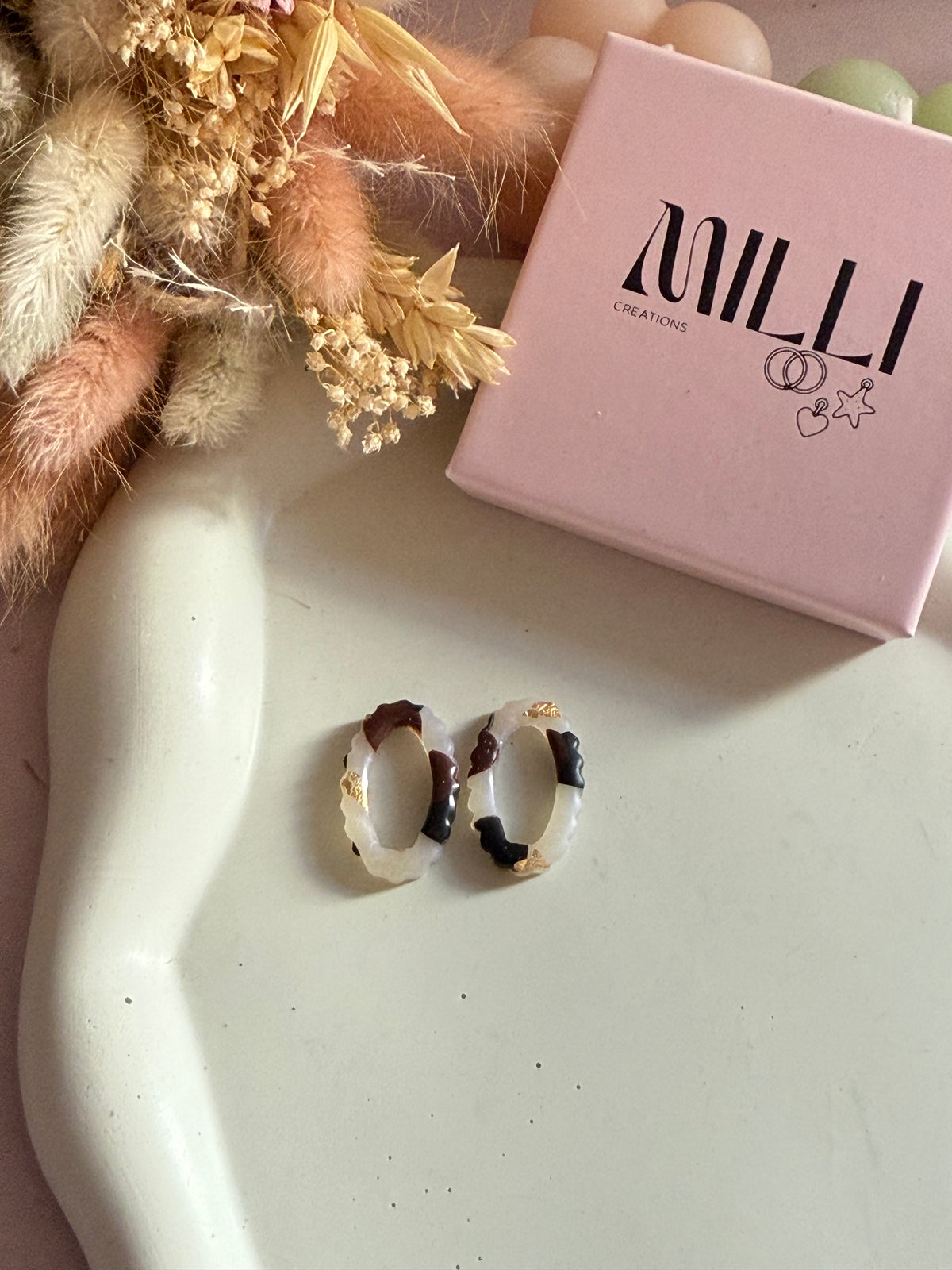 Charms Tif translucide noir et brun