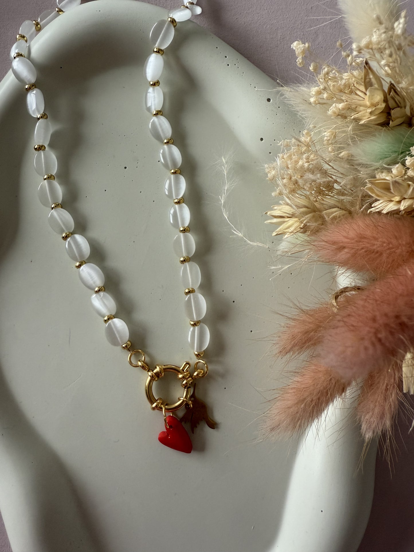 Collier perles transparentes pastilles